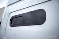 Universal-Fit Passenger Side Half-Slider Screened Window (9.4"H x 30.7"W)_Installed - Campervan HQ
