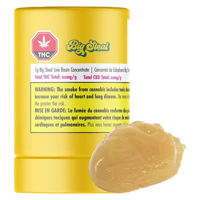 Close-up of a yellow tub labeled Big Steal Live Rosin with a glossy caramel-colored dab of concentrate in front.