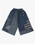 Washed indigo wide leg pants with patchwork by Kiriko Made
