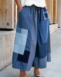 Washed indigo wide leg pants with patchwork by Kiriko Made