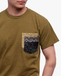 Green tee with yellow shibori and indigo patchwork by Kiriko Made