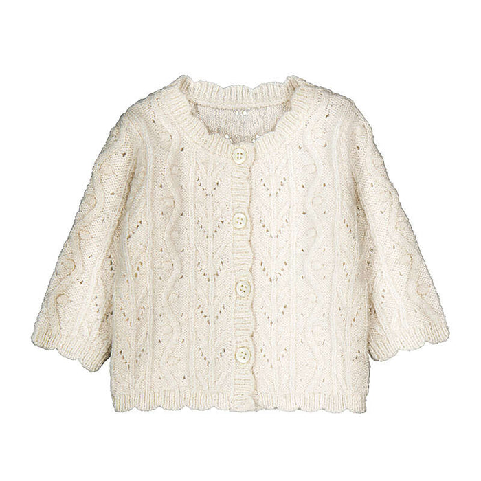Cream-colored knitted cardigan on a white background