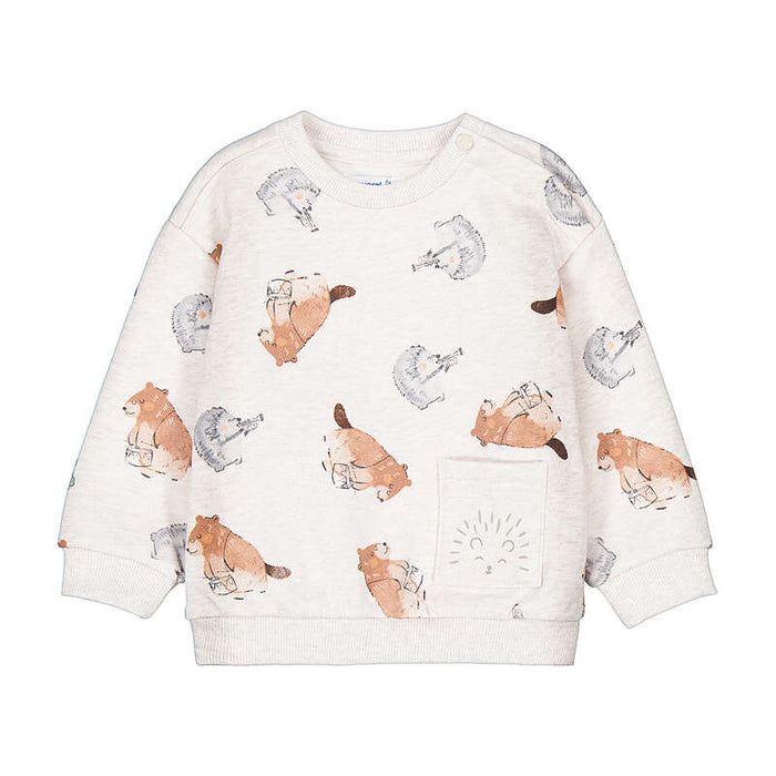 A baby long-sleeve sweatshirt in cream heather with an all-over watercolor print of foxes and hedgehogs, featuring a front pocket with a hedgehog design.