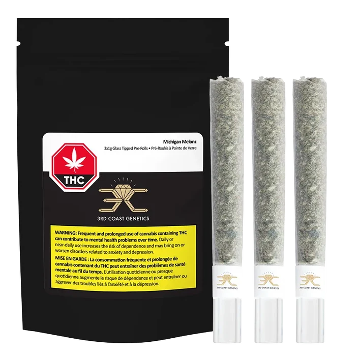 Black pouch standing next to three upright glass-tipped pre-rolls, labeled Michigan Melonz Glass Tip PR 3 x 1 g on the pouch.