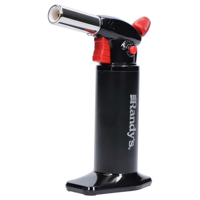Right-side close-up of Randy's Fahrenheit Butane Torch - Black showing its black cylindrical body with white logo, angled chrome nozzle, red controls, and glossy base