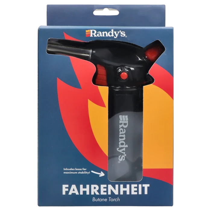 Packaging close-up showing the top of Randy's Fahrenheit Butane Torch - Black through a die-cut window with flame graphics.