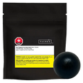 Front-facing black resealable pouch with a white label and yellow warning strip, accompanied by a round black resin ball, showing "Sour Tangerine Live Resin Hash."
