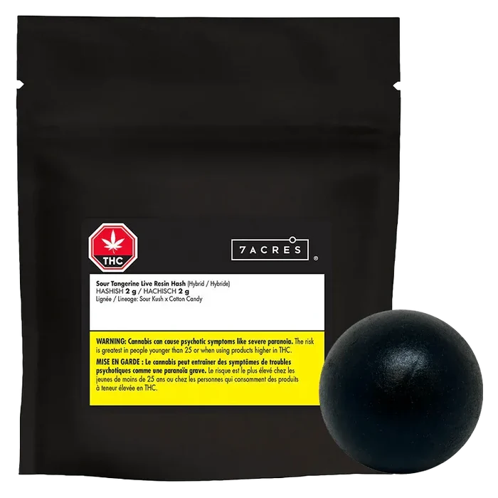 Front-facing black resealable pouch with a white label and yellow warning strip, accompanied by a round black resin ball, showing "Sour Tangerine Live Resin Hash."